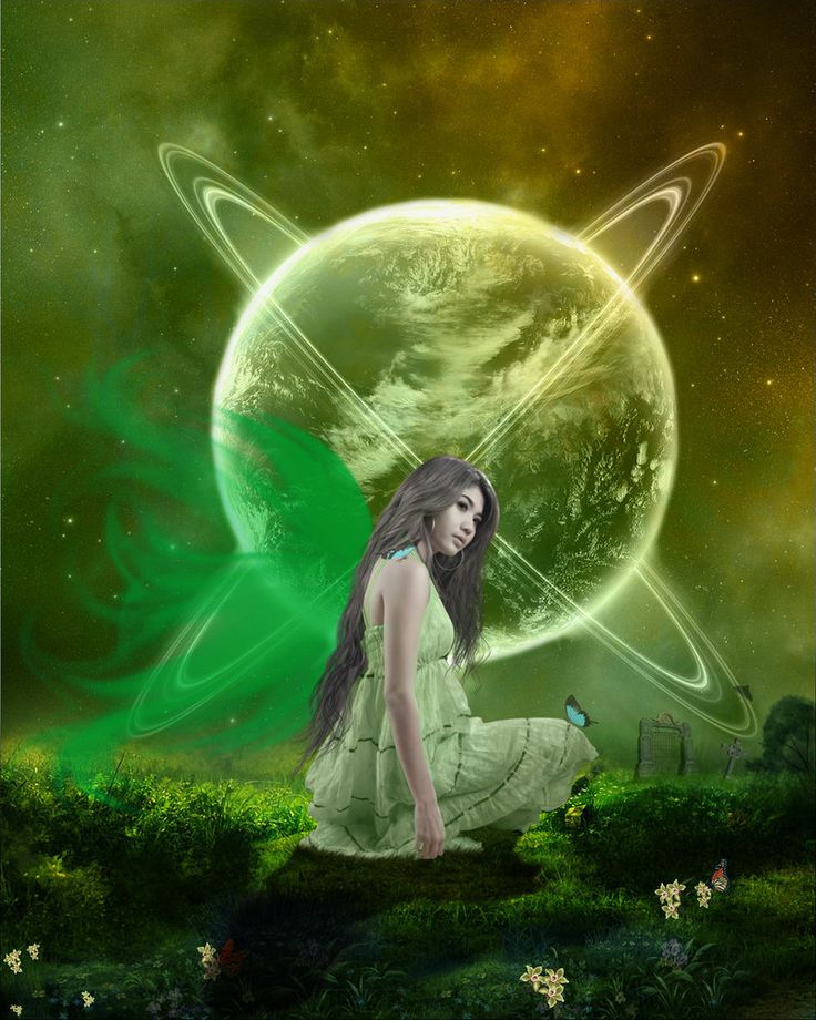 a woman sitting on top of a lush green field next to a giant moon and planets