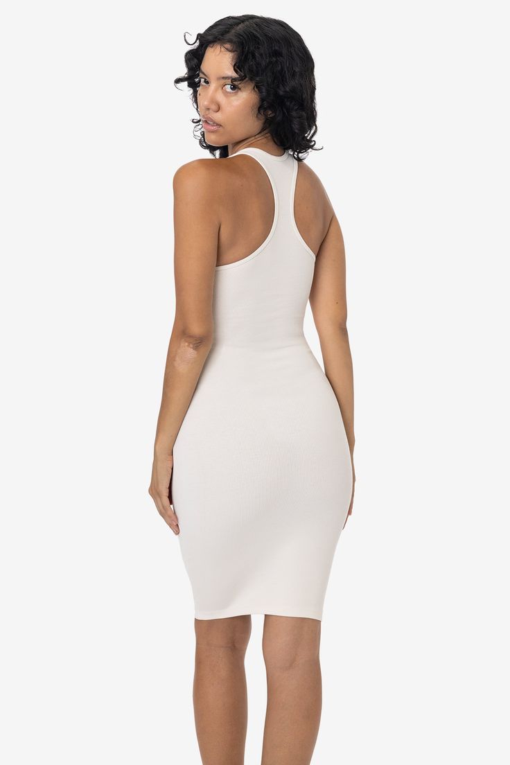 This sporty racerback dress is made of a heavy 2x1 rib with spandex so it has a flattering stretch. This textile features more compression than our regular cotton spandex styles and has been garment dyed and washed, so it is shrink-free, in 3 basic colors for your wardrobe. The mid-length of this dress makes it perfect for wearing day to night and is perfect for spring and summer. Made in Los Angeles, Calif. by sewers who are paid up to $20 an hour or more with benefits and overtime. • 2x1 Rib• Women In White, La Outfits, Black And White Baby, Racerback Dress, Sweaters And Leggings, Day To Night, To Night, Basic Colors, Dress For Women