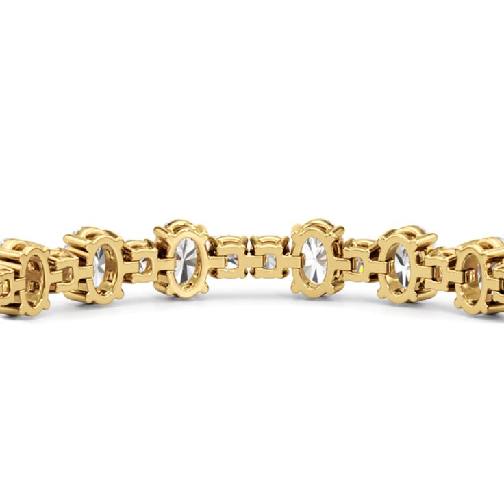 A remarkable find. This diamond tennis bracelet is something you can pass down from generation to generation. The pattern of alternating oval and cushion diamonds give this bracelet a specially stunning look. Oval Diamond Gold Bracelet With Jubilee Design, Modern Oval Diamond Bracelet For Anniversary, Timeless Oval Yellow Gold Diamond Bracelet, Timeless Yellow Gold Oval Diamond Bracelet, Oval Cubic Zirconia Tennis Bracelet With Jubilee Design, Oval Jubilee Tennis Bracelet With Cubic Zirconia, Luxury Oval Tennis Bracelet With Diamond Accents, Elegant Oval Tennis Bracelet With Single Cut Diamonds, Luxury Oval Bracelets With Diamond Accents