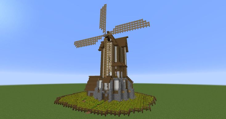 a windmill in the middle of a field