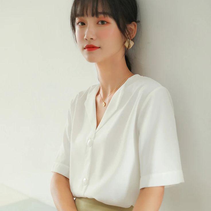 This is perfect for those who are looking for a clothing for a good price. It is fashionable, stylish, and it will look great on anyone who wears it. Do you wanahavit? Size(cm) Shoulder Bust Length Sleeve S 37 100 61 25 M 38 104 62 25.5 L 39 108 63 26 XL 40 112 64 26.5 *Tips: (1 cm=0.39 inch, 1 inch=2.54 cm) 1. Please strictly follow the size chart. Do not select the size directly according to your habits.2. The size information may have 1-3cm differences due to manual measurement. Trendy V-neck Blouse For Office Wear, White V-neck Office Blouse, Summer V-neck Workwear Shirt, Trendy V-neck Top For Office Wear, Spring V-neck Shirt For Office Wear, Trendy White Office Shirt, Summer Office Lady Blouse In Solid Color, Summer Office Blouse With Half Sleeves, Spring Button-up Ol Style Top