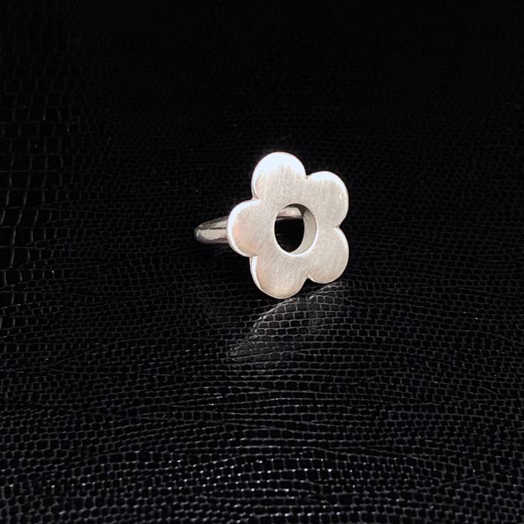 Stunning silver statement daisy shaped ring, perfect for every occasion and glam up any outfit. Simple, elegant and easy to wear! The daisy measures approx. 20mm in diameter. Ring size is made to order. Silver Daisy Ring, Silver Flower-shaped Rings For Spring, Silver Flower Shaped Rings For Spring, Silver Open Flower Ring For Spring, Nickel-free Flower Shaped Ring, Silversmith Workshop, Daisy Rings, Better Habits, Outfit Simple