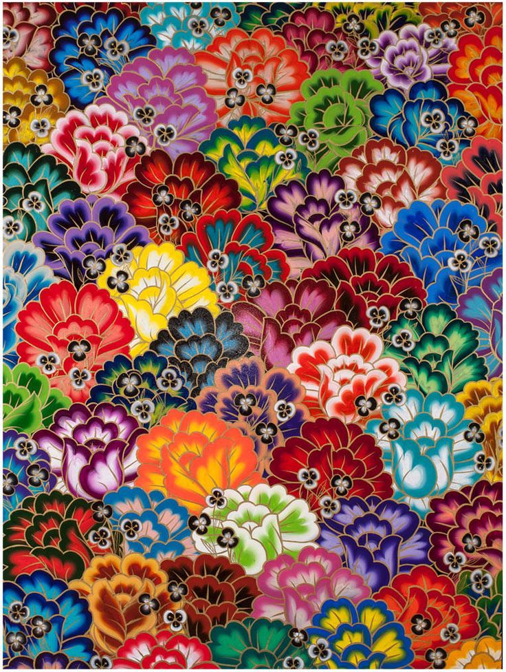 an image of multicolored flowers in the middle of a square pattern on fabric