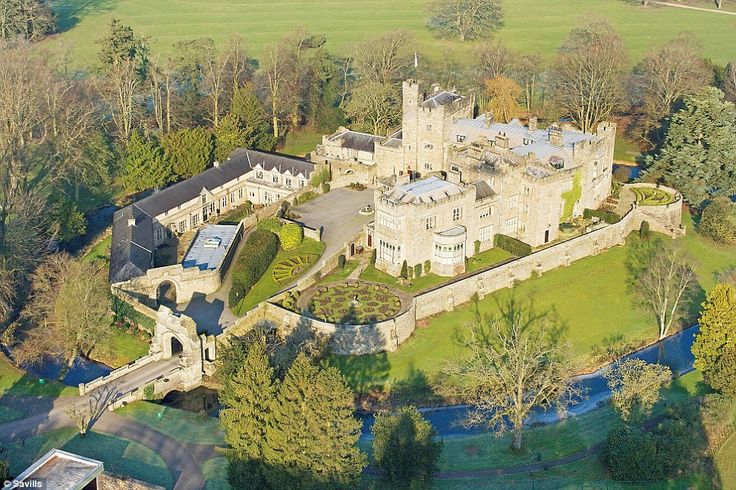 an aerial view of a castle in the countryside