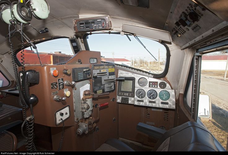 the cockpit of an airplane with multiple instruments on it's side and windows open