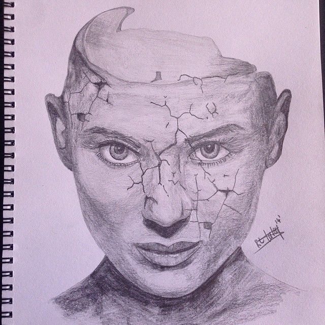 a pencil drawing of a man's face with cracked parts on his forehead and nose