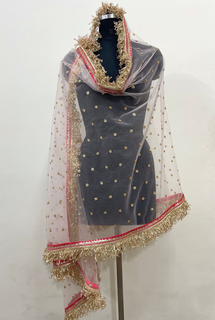 Pink net dupatta with frindges border work. Size: Dupatta is 100 inches (2.5 meter) long and 40 inches (1 meter) wide. Length of this dupatta can be customized as per your requirement. Fabric and work: Embroidered net fabric with frindges lace border. Delivery time: This dupatta will take 3-4 days to produce after we have received your order. While ordered with standard shipping it takes around 2-3 weeks in transit after we dispatch it. You can order with a shipping upgrade, with that it is ship Traditional Sharara With Sheer Dupatta And Kundan, Anarkali Traditional Wear With Sheer Dupatta For Festivals, Festive Semi-stitched Anarkali Set With Sheer Dupatta, Traditional Sharara With Sheer Dupatta In Chinon, Traditional Festive Sharara With Sheer Dupatta, Festive Churidar With Sheer Chanderi Dupatta, Festive Traditional Sharara With Sheer Dupatta, Traditional Chinon Sharara With Sheer Dupatta, Festival Dola Silk Anarkali Set With Sheer Dupatta