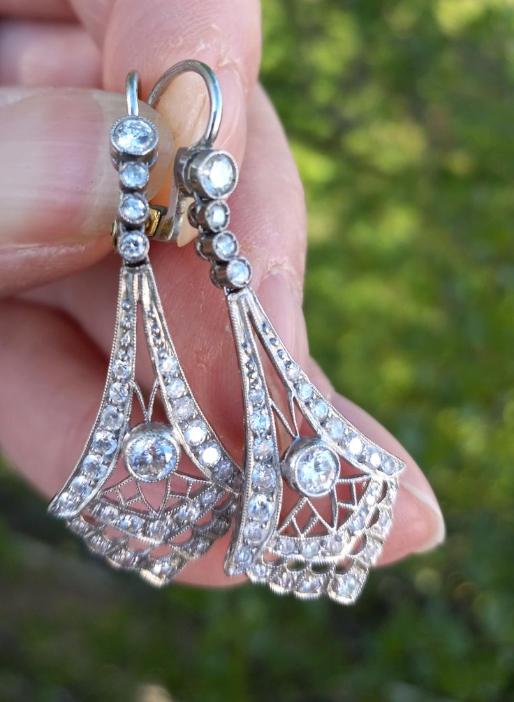 Absolutely Stunning 14k White Gold Diamond  Dangling earrings.  Earrings in perfect Pre Owned Condition  Pics ENLARGED to see details  All sales are final no return  ALL ITEMS FROM MY SHOP MUST BE PURCHASED STRAIGHT FROM ETSY.COM WEBSITE ONLY  Not thru Google and Others Offsite ads Luxury Platinum Diamond Earrings Hallmarked, Art Deco Silver Diamond Earrings In Platinum, Silver Art Deco Platinum Diamond Earrings, Luxury Hallmarked Pear-shaped Diamond Earrings, Evening White Gold Pierced Bridal Earrings, Vintage Silver Diamond Earrings In Platinum, Vintage Platinum Diamond Earrings In Silver, Classic Hallmarked Pear-shaped Diamond Earrings, Art Deco White Gold Diamond Earrings With Brilliant Cut