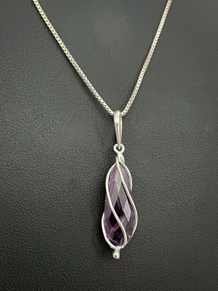 "GENUINE AMETHYST PENDANT Natural Amethyst Necklace, February Birthstone Jewelry NECKLACE FEATURES: Metal:  All components are made from solid .925 Sterling Silver  Model is wearing 16\" in length  solid .925 Sterling Silver Chain Length available:  16\", 18\" or 20\" Measurement:  Sterling Silver Natural Amethyst Pendant  Height: 28 mm  Width:  18 mm Please send me a message if you have any questions before or after placing your order. Please also view my policy before purchasing.  Please visit Luxury Amethyst Teardrop Pendant Necklace, Luxury Amethyst Teardrop Pendant Jewelry, Luxury Handmade Amethyst Crystal Necklace, Purple Teardrop Necklace For Wedding, Purple Faceted Jewelry For Wedding, Amethyst Birthstone Necklace For Wedding, Wedding Amethyst Birthstone Necklace, Silver Amethyst Necklace For Wedding, Magical Jewelry Pendants