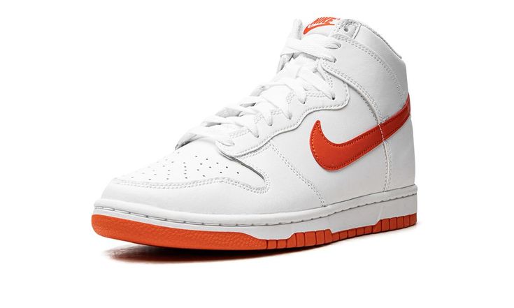 The Nike Dunk High “Picante Red” is a colorway of the retro basketball shoe with a vintage vibe.  Since returning in 2020, the Dunk has been among one of the most popular shoes in sneaker culture, and it’s easy to see why on colorways like the “Picante Red. ” The shoe features a white leather construction with tonal overlay panels.  A fiery Picante Red leather Swoosh logo is found on either side of the shoe.  The blazing hue of red also appears on the “Nike” and Swoosh branding on the tongue tag Most Popular Shoes, Sneaker Culture, Sb Dunk High, Retro Basketball Shoes, Retro Basketball, Dunk High, Popular Shoes, Nike Dunk High, Red Nike