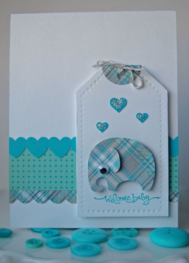 a blue and white card with an elephant on it's back, surrounded by buttons