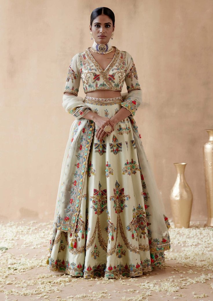 Aman Takyar | Mint Green Dupion Silk Lehenga Set | INDIASPOPUP.COM Anarkali Palazzo Set In Pista Green With Floral Embroidery, Pista Green Anarkali Palazzo Set With Floral Embroidery, Festive Pista Green Palazzo Set With Floral Embroidery, Embroidered Floor-length Green Palazzo Set, Festive Pista Green Floral Embroidered Palazzo Set, Wedding Palazzo Set With Floral Embroidery In Raw Silk, Wedding Palazzo Set With Floral Embroidery For Diwali, Bollywood Style Pista Green Palazzo Set With Floral Embroidery, Designer Tissue Silk Set With Floral Embroidery