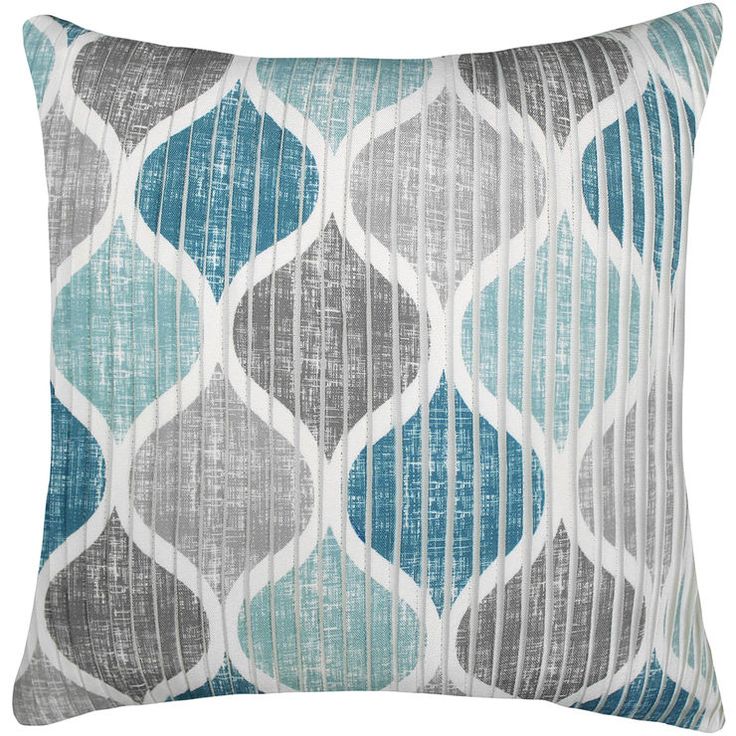 a blue and grey pillow with wavy lines on it