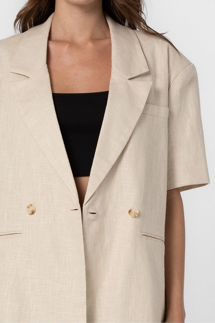 Half length sleeves Classic lapel collar One-button closure Single breast pocket Back vent Lined Fits oversized. Model measurements: Height 5'9", Bust 30.5", Waist 23.5", Hips 33.5" | Wearing a S/M. 85% Linen, 15% Cotton | Lining : 100% Polyester Oversized Blazer With Button Closure And Suit Collar, Collared Beige Blazer For Business Casual, Beige Collared Blazer For Business Casual, Beige Collared Blazer With Button Closure, Spring Business Blazer With Collar, Oversized Lapel Collar Blazer For Business Casual, Oversized Button-up Blazer For Business Casual, Oversized Blazer With Lapel Collar For Business Casual, Oversized Business Casual Blazer With Lapel Collar