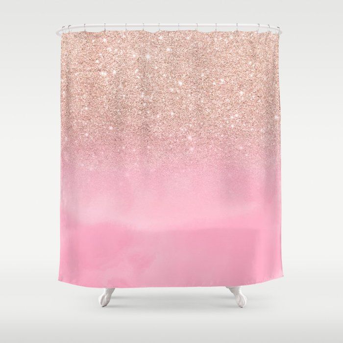 a shower curtain with pink glitter on it