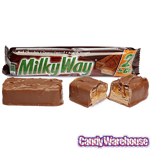 milk caramel and chocolate candy bar on white background