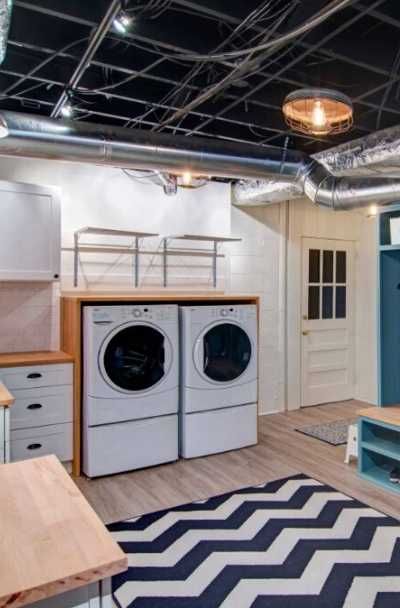 a laundry room with washer and dryer in it