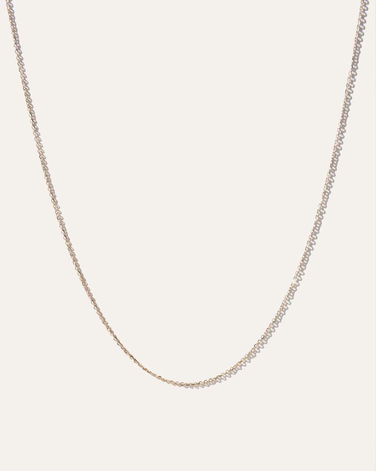 A delicate, chic classic that never goes out of style, a cable chain necklace is a must-have in every jewelry box. Even better: ours is made of 14k gold, justly priced, and looks great whether you’re layering it or wearing it solo.  | Quince | Women's 14k Gold Petite Cable Chain in Yellow Gold Classic Rose Gold Chain Necklace With Delicate Chain, Classic Delicate Rose Gold Chain Necklace, Classic Rose Gold Delicate Chain Necklace, Fine Jewelry Rose Gold Cable Chain Necklace, Timeless Delicate Chain Necklace In Rose Gold, Classic Double Chain Necklace Gift, Classic Double Chain Necklace For Gift, Minimalist Cable Chain Necklace For Layering, Delicate Oval Link Chain Necklace For Everyday Luxury