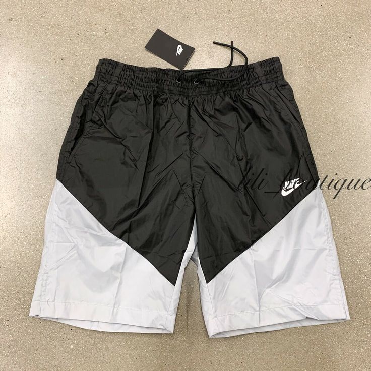 NWT Nike CT5617-010 Men Sportswear Windrunner Shorts Polyamide Black Grey Size S Details: 100% Authentic Style number: CT5617-010 Material: 100% Polyamide Color: Black grey Size: Small The breathable mesh lining An elastic waistband with drawstring offers an adjustable fit Open hand pockets Back zip pocket About 8" inseam Standard fit at knee length Please consider the size chart on picture #8 and #9 as a reference  Size approximately: waist 14" one side, 20.5" shorts length Retail: $55 + tax Ab Men Sportswear, Nylon Shorts, Open Hands, Grey Style, Active Wear Shorts, Shorts Men, Basketball Shorts, Mens Sportswear, Grey Shorts