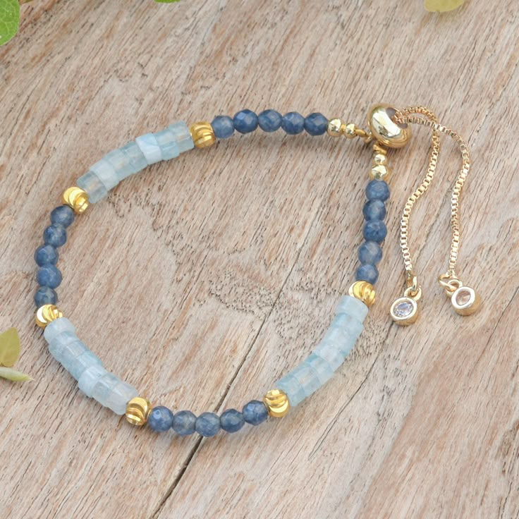 Pretty shades of blue quartz alternate between faceted round and disc shaped stones dotted with textured brass beads in this lovely bracelet from Nareerat in Thailand. The brass bead closure slides on a gleaming brass Venetian box chain allowing for a perfect fit. Beaded Turquoise Bracelet, Beaded Bracelets Silver, Faceted Beads Bracelet, Beach Inspired Bracelets, Adjustable Faceted Beaded Rondelle Bracelets, Adjustable Gemstone Beads Rondelle Bracelets, Adjustable Rondelle Gemstone Beads Bracelet, Adjustable Rondelle Bracelet With Gemstone Beads, Marble Beads Bracelet