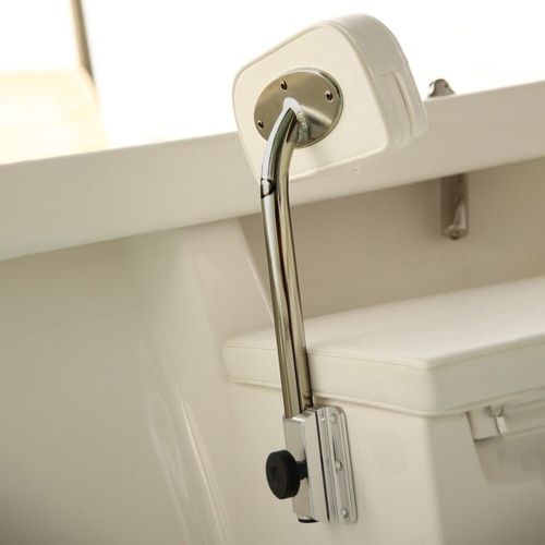 there is a metal handle on the side of a toilet in a bathroom with white walls and flooring