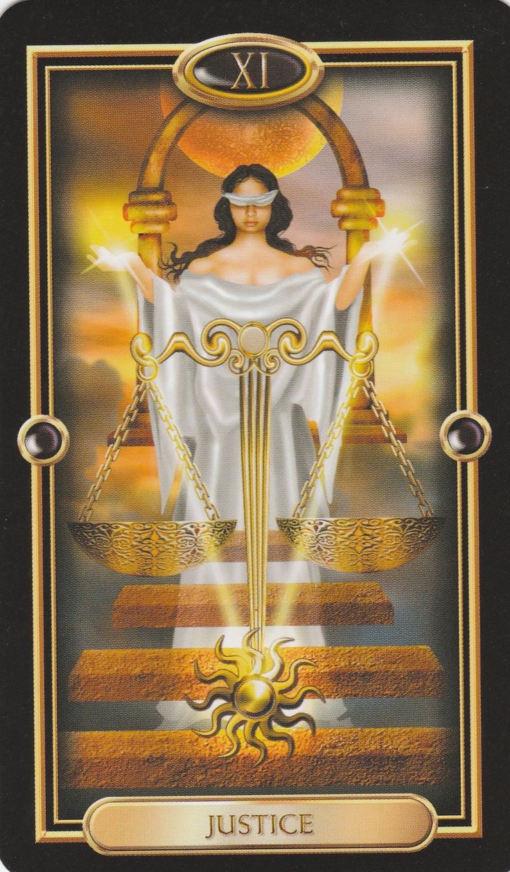 a tarot card with an image of the libras holding scales and two swords