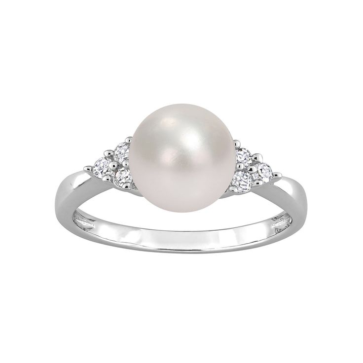 Featuring a lustrous freshwater cultured pearl and dazzling diamond side stones, this Stella Grace ring is a stylish complement to your wardrobe.Click on this JEWELRY & WATCHES GUIDE to learn about fit, styles, materials and more! Width: 8.4 mm Metal: sterling silver Plating: rhodium Finish: polished Packaging: boxedDIAMOND DETAILS Total weight: 1/8 ct. Shape: round Setting: prongCULTURED PEARL DETAILS Type: freshwater Size: 8 mm - 8.5 mm Shape: round Color: white Diamond weights are approximate Timeless White Gold Pearl Ring With Diamond Accents, Timeless Anniversary Pearl Ring With Diamond Accents, Timeless Pearl Ring With Diamond Accents For Anniversary, Classic White Pearl Ring With Diamond Accents, White Gold Pearl Ring With Diamond Center Stone, Timeless Diamond-white Pearl Ring With Diamond Accents, Timeless Diamond White Pearl Ring With Diamond Accents, Silver Pearl Rings With Diamond Accents, Silver Rings With Diamond Accents And Pearl