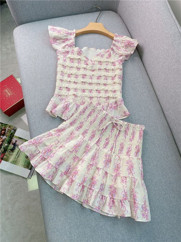 SPECIFICATIONS Brand Name: IFOMT Age: JUNIOR Material: Polyethersulfone Elasticity: Non Strech Fabric Type: Polyester Cotton Style: Sweet Pattern Type: Floral Fit Type: Regular Season: Summer Decoration: Pleat Free shipping: DS drop shiping: whole sale UNIT: CM IN STOCK MANUAL MEASUREMENT3CM ERROR WITHIN.IS NORMAL 1(cm)=0.39(in) Top S:Length:51 Bust:68 S:Length:52 Bust:72 S:Length:53 Bust:76 Skirts S:Waist:58 Length:38 Hip:96 S:Waist:62 Length:39 Hip:100 S:Waist:66 Length:40 Hip:104 Summer Casual Sets With Ruffle Hem, Casual Summer Sets With Ruffle Hem, Summer Sets With Ruffle Hem And Fitted Design, Fitted Casual Sets With Ruffles, Casual Fitted Sets With Ruffles, Summer Sets With Fitted Ruffle Hem, Spring Fitted Set With Ruffled Skirt, Fitted Spring Set With Ruffled Skirt, Feminine V-neck Sets For Summer