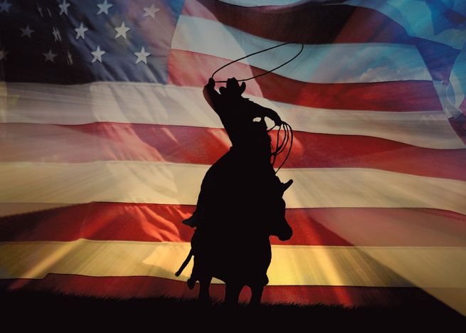 the silhouette of a cowboy on a horse with an american flag in the back ground