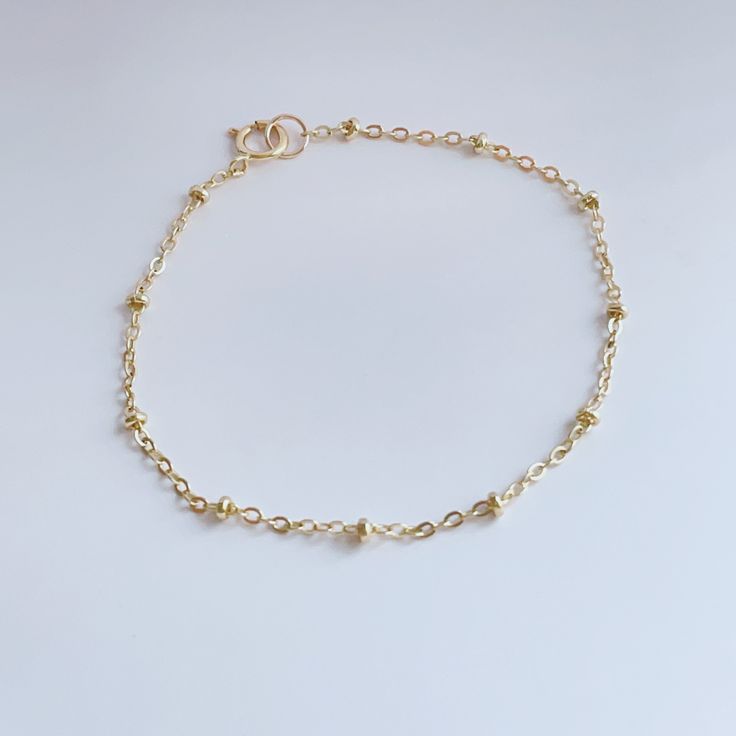 Rock everyday your satellite chain bracelet, all made with 14K gold fill that’s water resistant. Measures: 6 inch +1 in extension chain Dainty Adjustable Yellow Gold Paperclip Bracelet, Gold Delicate Adjustable Paperclip Bracelet, Dainty 14k Gold Bracelet With Extender, Everyday 14k Gold Chain Bracelet With Extender, Adjustable Rose Gold Bracelet With Satellite Chain, Adjustable Rose Gold Satellite Chain Bracelet, Adjustable Rose Gold 14k Gold-filled Bracelets, Rose Gold Adjustable Chain Bracelet, 14k Gold Filled, Rose Gold Adjustable Chain Bracelet In 14k Gold Filled