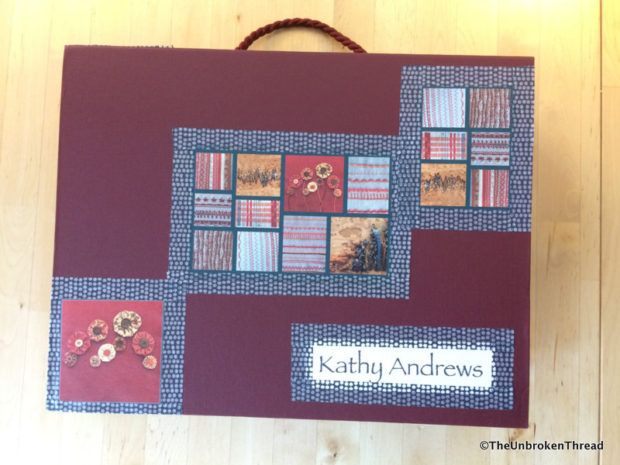 a handmade card with flowers and squares on it