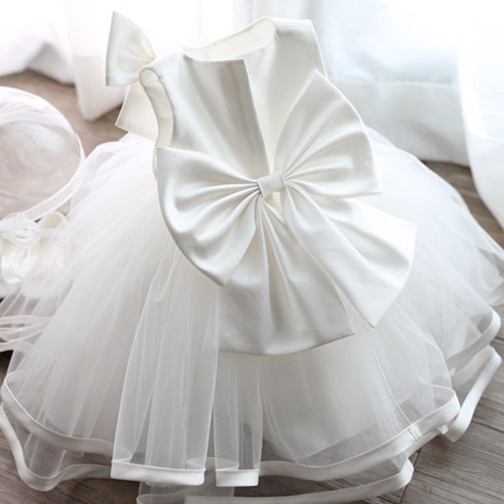 Sleeveless Dress With Bow For Birthday, Spring Princess Tutu Dress With Bow, Summer Tutu Dress With Bow For Baptism, Summer Baptism Tutu Dress With Bow, Spring Princess Style Tutu Dress With Bow, White Bow Tutu Dress For Summer, Sleeveless Princess Dress With Bow For Birthday, Cute Princess Dress With Bow For First Birthday, Summer Princess Baptism Dress For Birthday