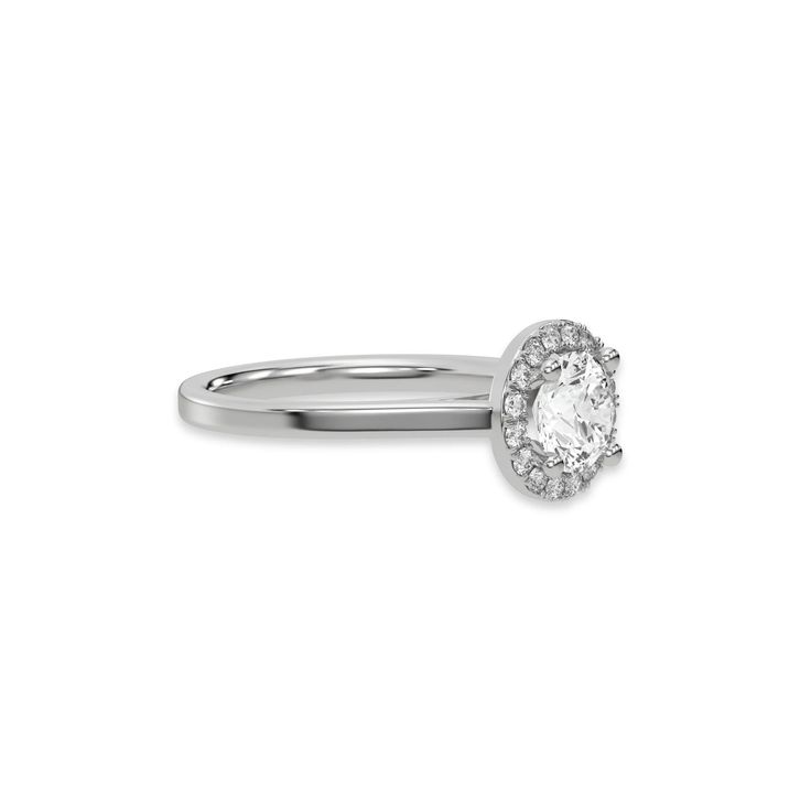 This ring features an round solitaire diamond elegantly secured in a four-prong setting on a solid gold band for a classic and timeless look.Details: - Made to Order- Diamond Weight: 0.10 CT, 0.20 CT, 0.30 CT, 0.40 CT, 0.50 CT, 0.75 CT, 1.00 CT - Accent Diamond Weight: 0.10 CT to 0.20 CT (Carat weight varies based on chosen Focal Diamond)- Diamond Type: Natural Diamond- Diamond Cut: Round- Diamond Clarity: SI (0.10 CT - 0.49 CT), VS (0.50 CT - 1.00 CT)- Diamond Color: G+- Setting Type: Prong and Pave- Band Thickness: 1.70 MM- Band Width: 2.00 MM- Metal Type: 14K Solid Gold,18K Solid Gold- Choice of Gold Color: Yellow Gold, White Gold, Rose Gold- Jewelry Certificate: All our jewelry comes with a 3rd Party Lab Certificate, verifying the authenticity of diamond and gold.- Diamond Certificate: Fancy Color Diamond Ring, Round Cut Halo Engagement Ring, Round Halo Engagement Rings, Colored Diamond Rings, Halo Necklace, Round Solitaire, Solid Gold Band, Halo Earrings, Halo Earrings Studs