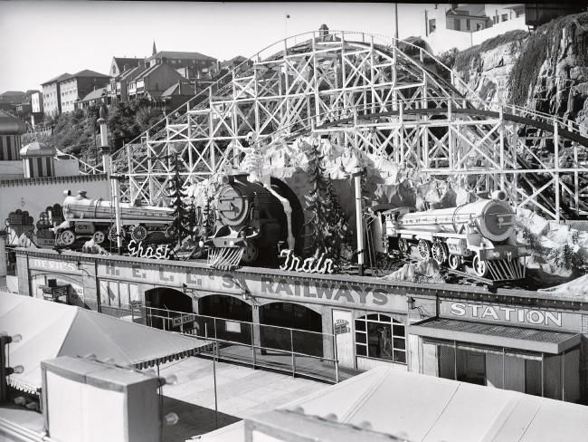 black and white photograph of an amusement park