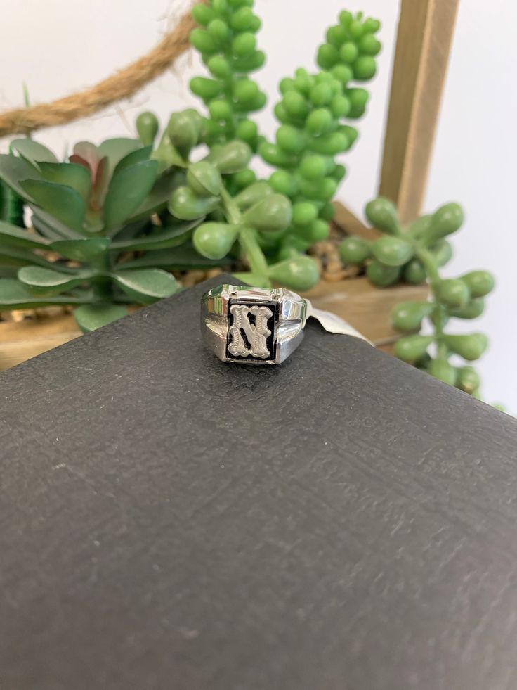 Initial "N" signet ring in sterling silver. The small size can also be for a child. Size 6 Classic Silver Initial Ring With Monogram, Adjustable Symbolic Signet Ring Stamped 925, Classic Silver Monogram Ring, Classic Silver Ring With Monogram, Silver Monogram Signet Ring, Silver Monogram Signet Ring For Formal Occasions, Nickel-free Sterling Silver Signet Ring Gift, Modern Silver Adjustable Initial Ring, Adjustable Silver Monogram Ring