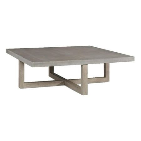 a square concrete table with metal legs on an isolated white background, viewed from the front