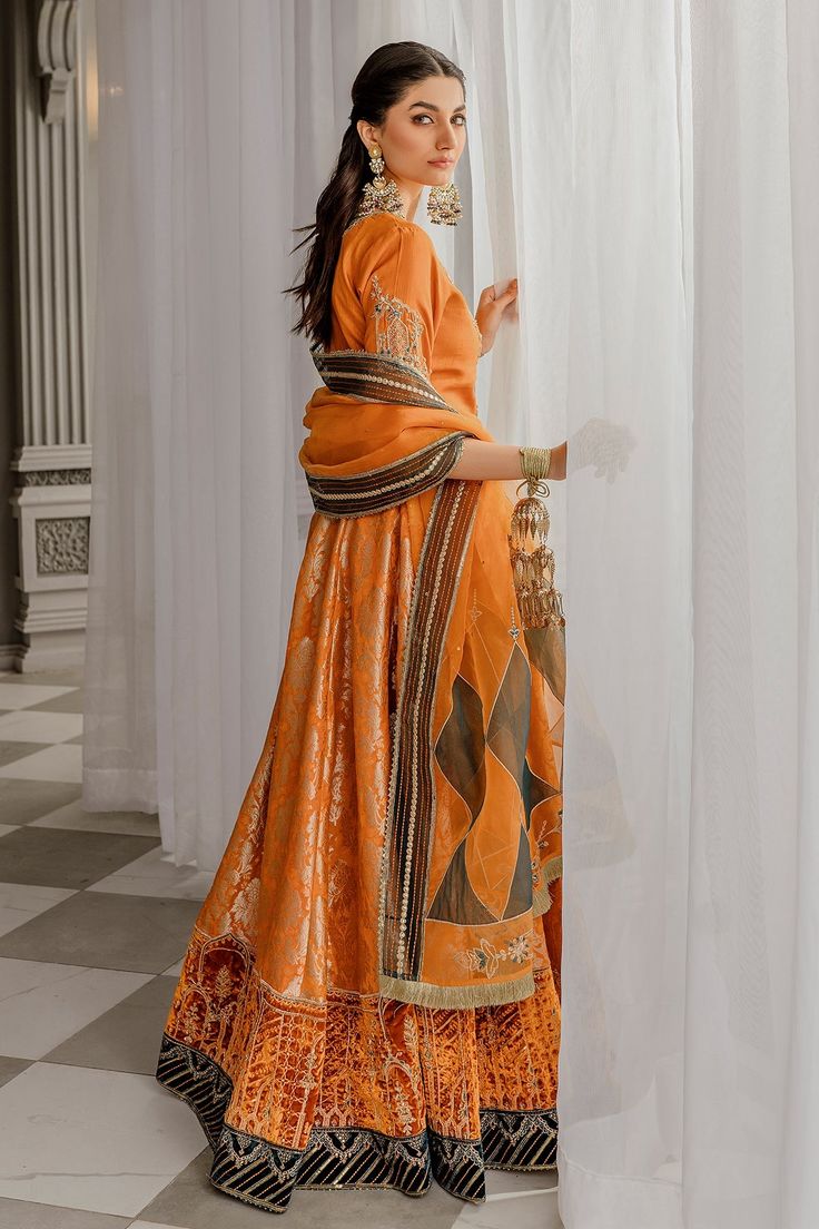 Orange Sharara With Straight Kurta For Diwali, Orange Cutdana Kurta For Eid, Orange Kurta With Cutdana For Eid, Orange Chanderi Anarkali Set For Navratri, Orange Salwar Kameez With Cutdana For Navratri, Bollywood Style Orange Sharara With Straight Kurta, Orange Straight Kurta Sharara For Navratri, Orange Semi-stitched Sharara With Straight Kurta, Designer Orange Sharara With Traditional Drape