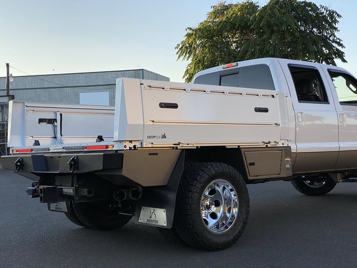 a large white truck parked in a parking lot