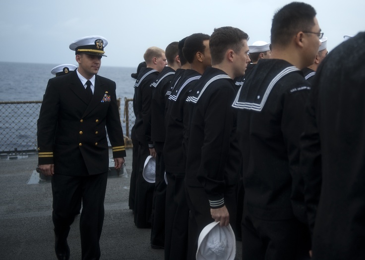 a group of sailors standing next to each other