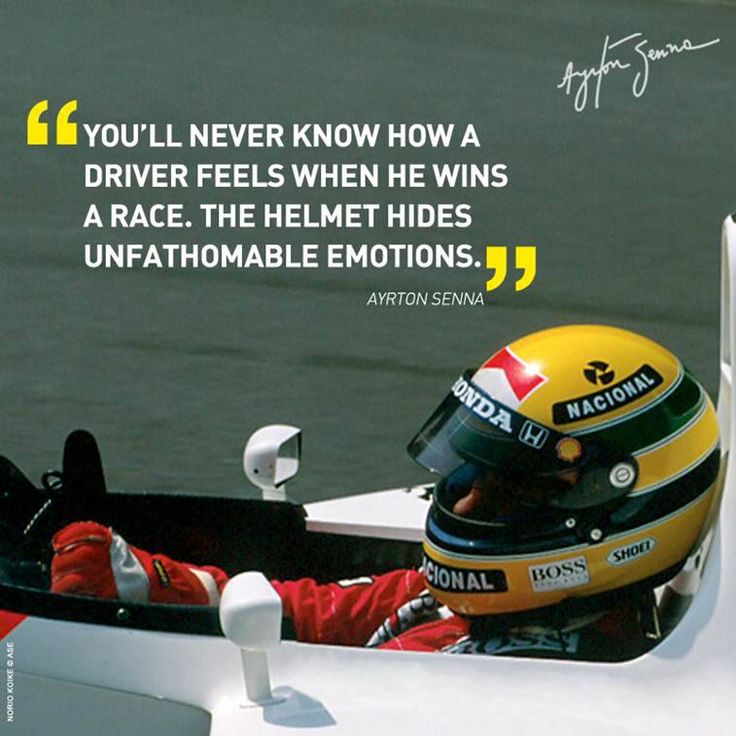 a man sitting in a race car with a helmet on and an inspirational quote above him