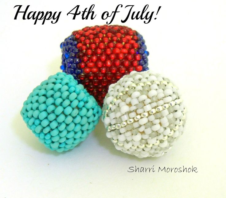 three beaded balls with the words happy 4th of july