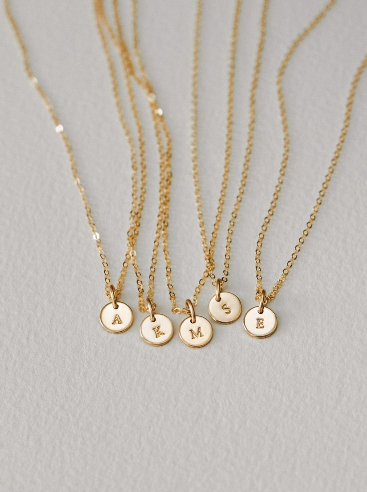 Tell a tiny story and make it all about Yue. This personalized necklace is a GLDN staple (and for good reason)! Personalize with special initials or one of over 30 symbols—the perfect anniversary gift, birthday gift or milestone gift. Each piece is hand-personalized in our studio with traditional metal punches, and available in top-quality 14k gold fill, sterling silver, rose gold fill and 14k solid gold. Another reason to love this piece: you can add extra disks as your story grows! Minimalist 14k Gold Filled Initial Necklace Gift, Custom Name Jewelry With Initial Pendant For Everyday, Simple Initial Pendant Charm Necklace For Gift, Dainty 14k Gold Filled Engraved Charm Necklaces, Minimalist Name Initial Pendant Charm Necklaces, Minimalist Name Charm Necklace With Initial Pendant, Minimalist Custom Name Pendant Charm Necklaces, Customizable 14k Gold Initial Pendant Jewelry, Delicate Personalized Pendant Charm Necklaces