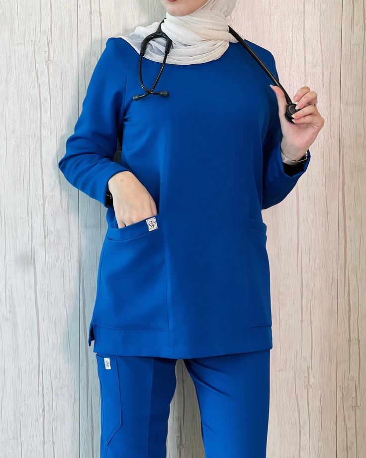 Royally comfortable in TSP’s royal blue long sleeves scrubs 👑💙 . Royal Blue Scrubs Outfit, Modest Scrubs, Long Sleeve Scrubs, Hijabi Wardrobe, Nurse Fashion Scrubs, Nurse Clothes, Royal Blue Scrubs, Stylish Scrubs, Medical Scrubs Outfit