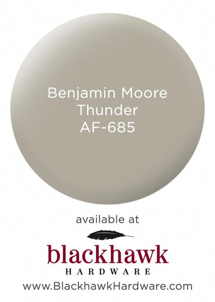 a white paint with the words blackhawk on it and an image of a gray background