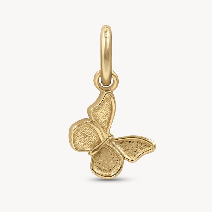 14k Yellow Gold Charms with Natural White Diamonds. A stunning piece that celebrates the beauty of everyday items in the most elegant way! We just added some new additions, the Dog Paw, Shell, Flower, and Butterfly. Each charm can be seamlessly incorporated into your bracelet or necklace. They become a distinctive reflection of your individuality, allowing you to showcase the cherished symbols that hold a special place in your heart. Silver 14k Gold Charm Necklaces, Luxury Butterfly Charm Pendant Jewelry, Luxury Jewelry With Butterfly Charm Pendant, Luxury Jewelry Pendant With Butterfly Charm, Luxury Pendant Jewelry With Butterfly Charm, Fine Jewelry Butterfly Charm As Gift, Fine Jewelry Charms As Gifts, Elegant Sterling Silver Charm Necklaces With Removable Charms, 14k Gold Symbolic Charms Jewelry