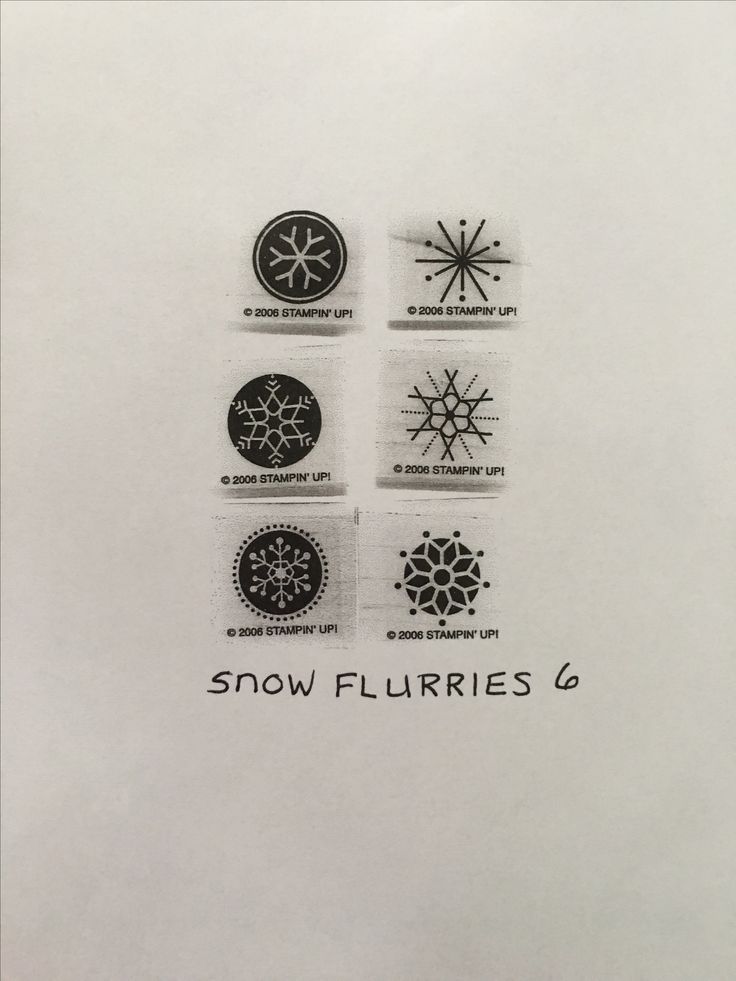 four snowflurries are shown in black and white on a sheet of paper