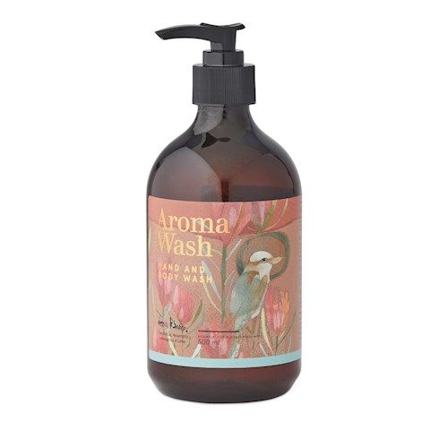 a bottle of hand soap with pink flowers on it and a black pump that says aroma wash