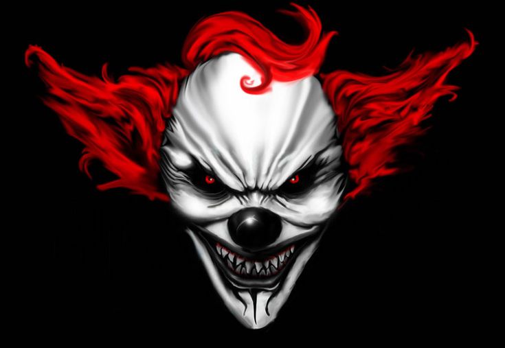 a scary clown with red hair and fangs on it's face is shown in this image