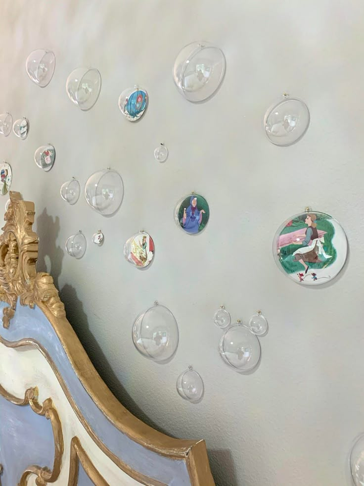 a bed with lots of bubbles on the wall