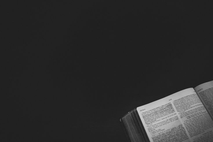 an open book sitting on top of a table